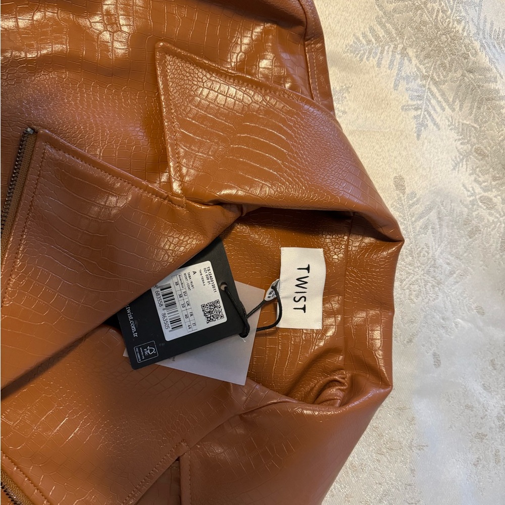 Faux leather jacket with the jeans sleeve Brand new from Europe